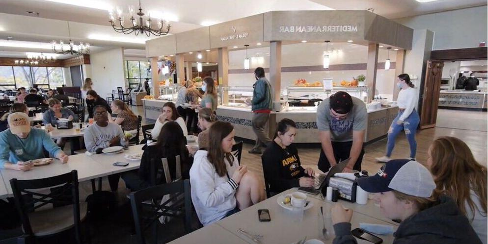 Students enjoy meals in the dining hall